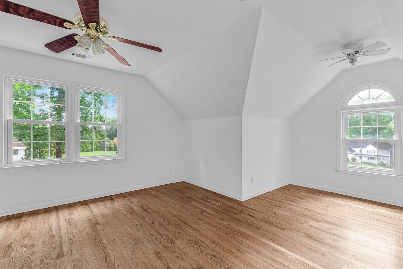 Bonus room with hardwood floors