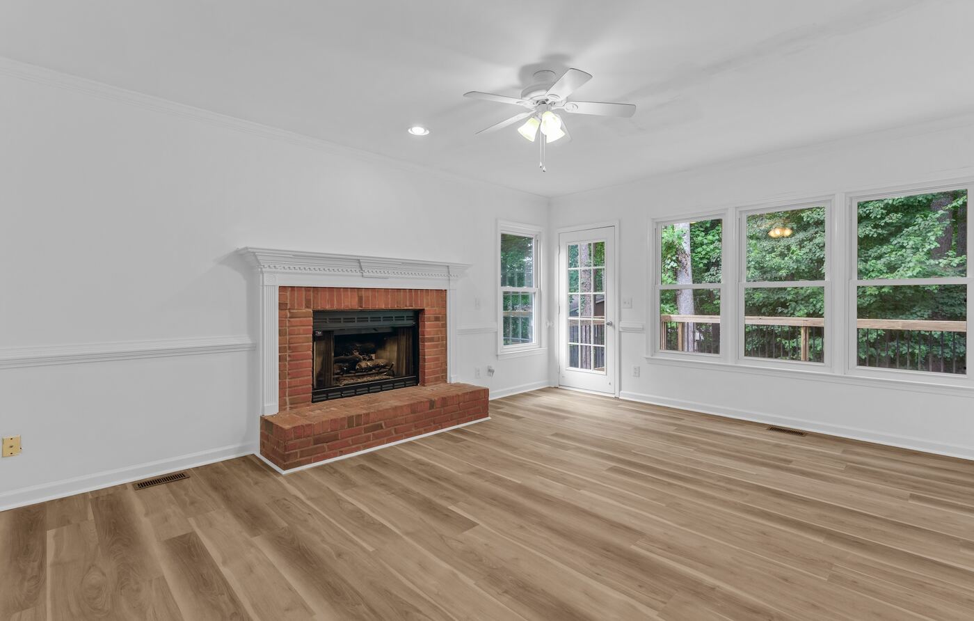 Family room with brick fireplace