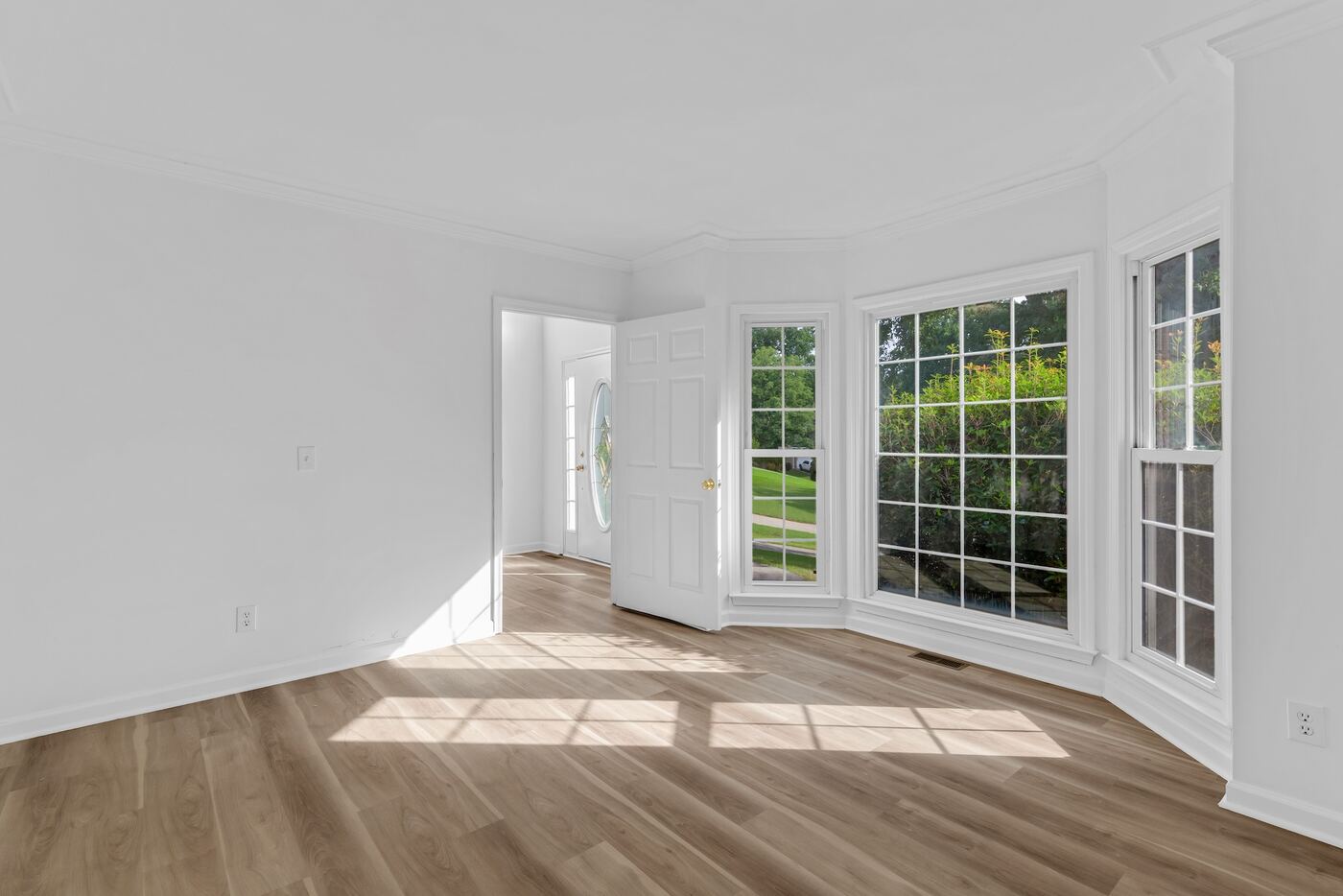 Living room with bay windows